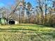 Wooded backyard with detached shed at 722 Tanglewood Dr, Salisbury, NC 28144