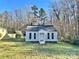 Newly renovated gray house with a white door, steps, and a grassy yard at 722 Tanglewood Dr, Salisbury, NC 28144