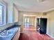 Simple kitchen with white cabinets, granite countertops, and dark wood floors at 722 Tanglewood Dr, Salisbury, NC 28144