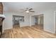 Open concept living room with kitchen and hardwood floors at 1744 Laurel Ln, Gastonia, NC 28054