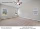 Primary bedroom with vaulted ceilings and ceiling fan at 204 Lake George Dr, Shelby, NC 28152