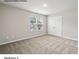Standard size bedroom with double doors and window at 204 Lake George Dr, Shelby, NC 28152