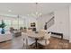 Dining area with a view into the living room and kitchen at 208 Waterlynn Ridge Rd # B, Mooresville, NC 28117