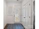Bright entryway with tile flooring and access to backyard at 208 Waterlynn Ridge Rd # B, Mooresville, NC 28117