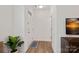 Bright and airy foyer with hardwood floors and access to other rooms at 208 Waterlynn Ridge Rd # B, Mooresville, NC 28117