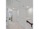Upstairs hallway with carpet, attic access, and linen closet at 208 Waterlynn Ridge Rd # B, Mooresville, NC 28117
