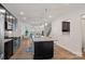 Spacious kitchen with an island, granite countertops, and stainless steel appliances at 208 Waterlynn Ridge Rd # B, Mooresville, NC 28117