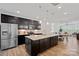 Modern kitchen with stainless steel appliances and a large island at 208 Waterlynn Ridge Rd # B, Mooresville, NC 28117