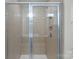 Shower stall with built-in seat and tiled walls at 208 Waterlynn Ridge Rd # B, Mooresville, NC 28117