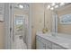 Bright bathroom with a sink, vanity, and shower at 26243 Camden Woods Dr, Indian Land, SC 29707