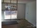 Dining area with sliding glass doors leading to the backyard at 441 Holly Cir, Mount Holly, NC 28120