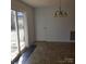 Dining area with sliding glass doors leading to the backyard at 441 Holly Cir, Mount Holly, NC 28120