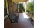 Relaxing front porch with a porch swing, perfect for enjoying the outdoors at 441 Holly Cir, Mount Holly, NC 28120