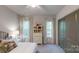 Charming bedroom with two windows, plush bedding, and ample natural light at 811 Irish Creek Dr # 1, Landis, NC 28088