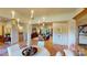 Elegant dining room with chandelier and view into living room at 811 Irish Creek Dr # 1, Landis, NC 28088
