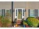 Charming front door with lanterns and seasonal decor at 1110 Archer Farm Dr, Salisbury, NC 28144