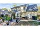 Home's backyard with patio, grill, and landscaping at 1846 Colin Creek Ln, Charlotte, NC 28214
