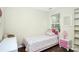 bedroom with Hello Kitty bed and built-in shelving at 1846 Colin Creek Ln, Charlotte, NC 28214