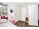 bedroom with Hello Kitty bed and built-in shelving at 1846 Colin Creek Ln, Charlotte, NC 28214