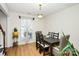 Dining area with a black table and four chairs at 1846 Colin Creek Ln, Charlotte, NC 28214
