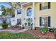 House exterior featuring columns and landscaping at 1846 Colin Creek Ln, Charlotte, NC 28214