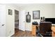 Home office features a desk, chair, and built-in shelving at 1846 Colin Creek Ln, Charlotte, NC 28214