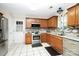 Bright kitchen with stainless steel appliances and granite countertops at 1846 Colin Creek Ln, Charlotte, NC 28214