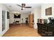 Living room with brick fireplace, hardwood floors, and French doors at 1846 Colin Creek Ln, Charlotte, NC 28214