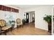 Bright sitting room with hardwood floors and two armchairs at 1846 Colin Creek Ln, Charlotte, NC 28214