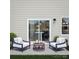 Cozy patio with two chairs and a round table at 2131 Endeavor Run, Charlotte, NC 28269