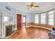 Spacious living room featuring hardwood floors, bay windows, and a fireplace at 307 Kings Mountain St, Clover, SC 29710