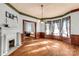 Bright living room with hardwood floors, bay windows, and a fireplace at 307 Kings Mountain St, Clover, SC 29710