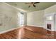 Spacious bedroom with hardwood floors and fireplace at 307 Kings Mountain St, Clover, SC 29710