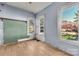 Simple bedroom with hardwood floors and large windows at 307 Kings Mountain St, Clover, SC 29710