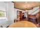 Living area with hardwood floors, fireplace, and access to other rooms at 307 Kings Mountain St, Clover, SC 29710