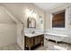 Bathroom with a classic clawfoot tub and modern vanity at 307 Kings Mountain St, Clover, SC 29710