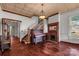 Grand living room with hardwood floors, fireplace, and high ceilings at 307 Kings Mountain St, Clover, SC 29710