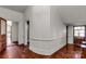 Long hallway with wood flooring and vintage doors at 307 Kings Mountain St, Clover, SC 29710