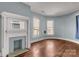 Charming bedroom with hardwood floors and fireplace at 307 Kings Mountain St, Clover, SC 29710