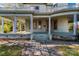 Home's entrance featuring a wide porch with stone steps and columns at 307 Kings Mountain St, Clover, SC 29710