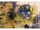 Aerial view of a house, yard, and surrounding trees at 307 Kings Mountain St, Clover, SC 29710