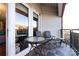 Outdoor balcony with patio furniture and city views at 401 N Church St # 406, Charlotte, NC 28202