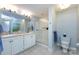 Elegant bathroom with double sinks, shower and toilet at 401 N Church St # 406, Charlotte, NC 28202