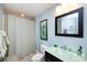 Clean bathroom with shower, toilet, and vanity at 401 N Church St # 406, Charlotte, NC 28202