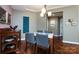 Spacious dining room with hardwood floors and a view into the living room at 401 N Church St # 406, Charlotte, NC 28202