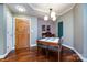 Elegant dining room with hardwood floors and chandelier at 401 N Church St # 406, Charlotte, NC 28202