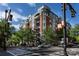 Brick building exterior with green roof and city view at 401 N Church St # 406, Charlotte, NC 28202