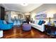 Spacious living room boasts hardwood floors, a comfy sofa, and an inviting atmosphere at 401 N Church St # 406, Charlotte, NC 28202