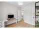 Modern home office featuring a standing desk and ample space at 8225 Ballymore Ct, Huntersville, NC 28078