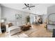 Open concept living room and kitchen with hardwood floors at 8225 Ballymore Ct, Huntersville, NC 28078